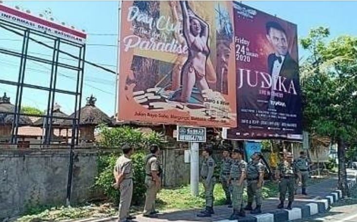 A Large Billboard on Jalan Raya Batubulan Removed For Picturing Girl In Bikini