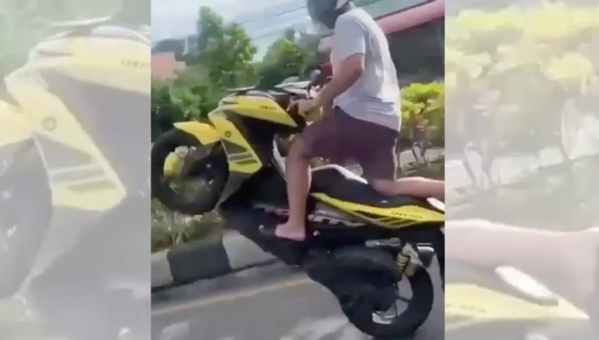 C:\Users\coach\Desktop\Dangerous Motorbike Driver Escapes Bali After Wheelie Stunt In Seminyak.jpg