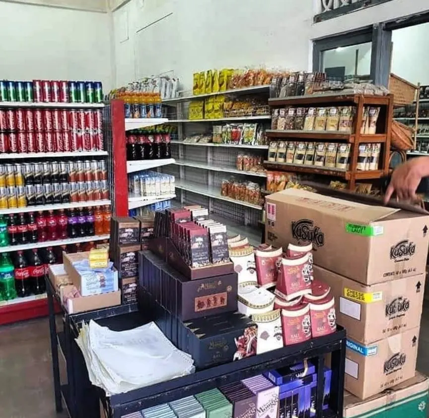 bintang supermarket restocks shelves in temporary store