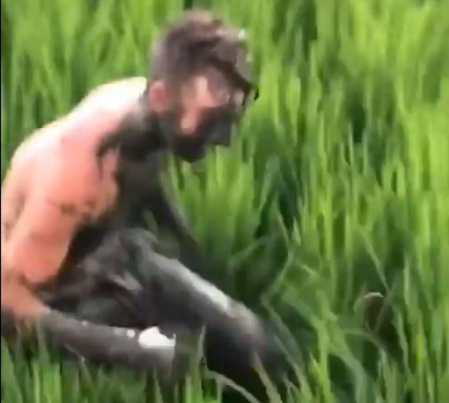 foreigner covered in dirt in bali