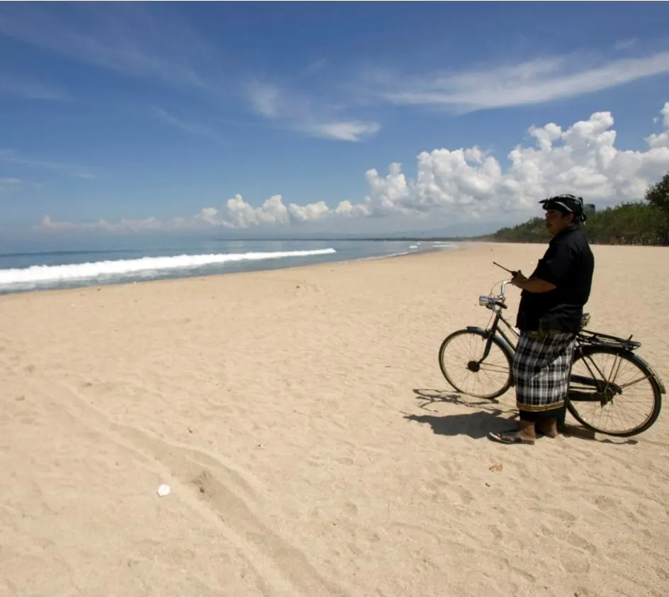 Bali Village head patrols beach