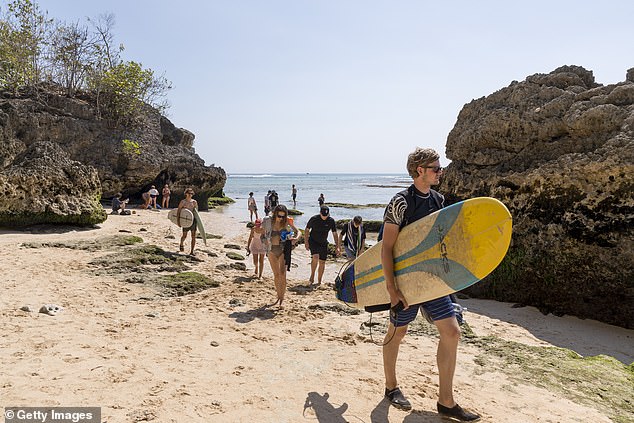 australians on beach in bali