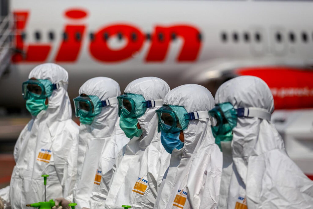 Lion Air workers in hazmat suits
