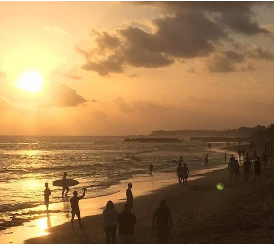 canggu beach at sunset full of people