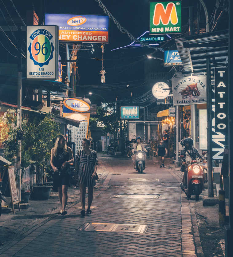 bali street at night in kuta