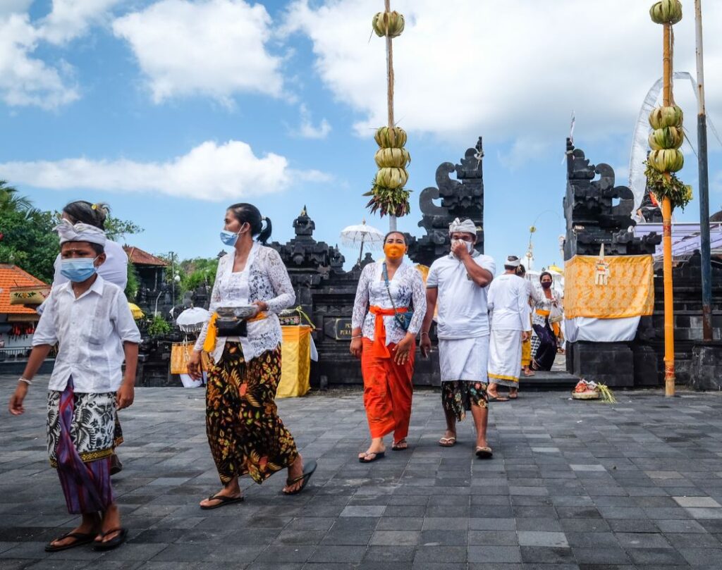 Bali locals wearing masks