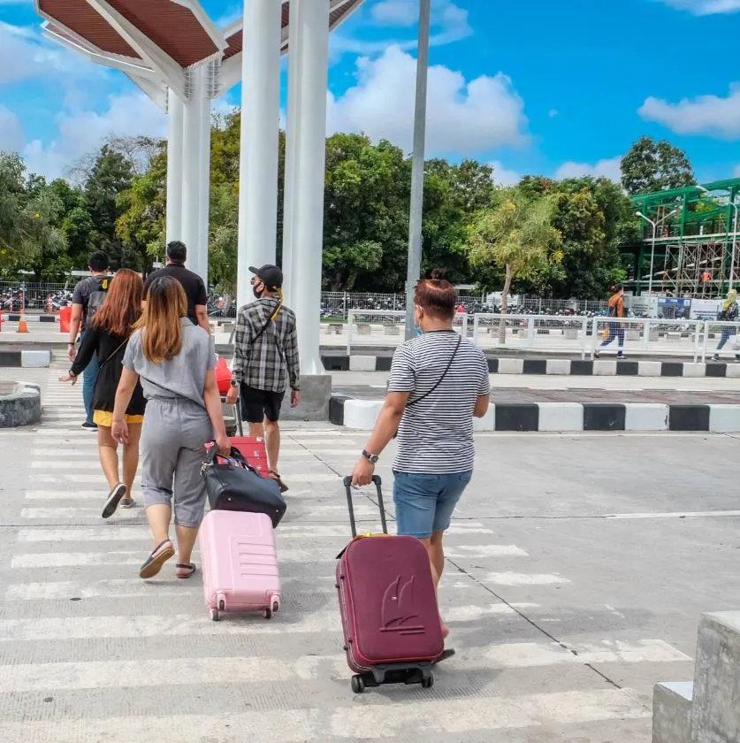 bali domestic tourists arrive in masks bali airport