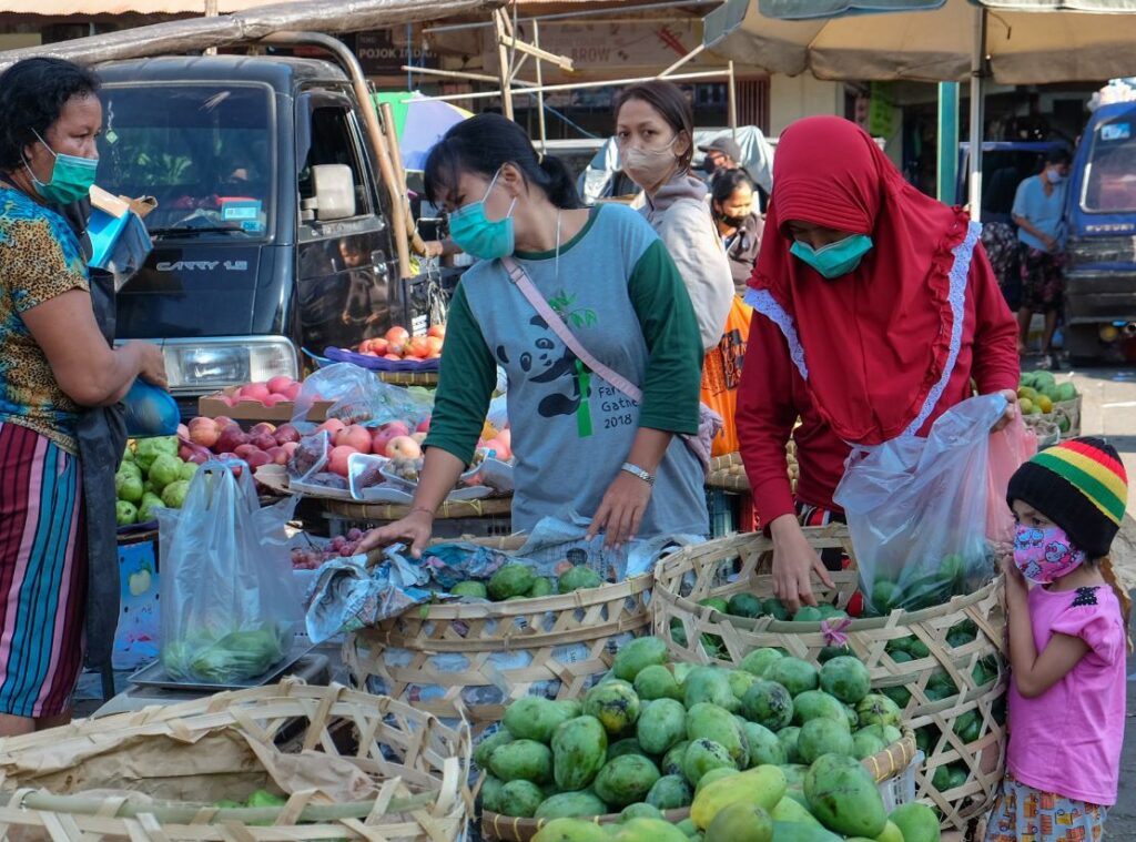 bali locals wearing masks