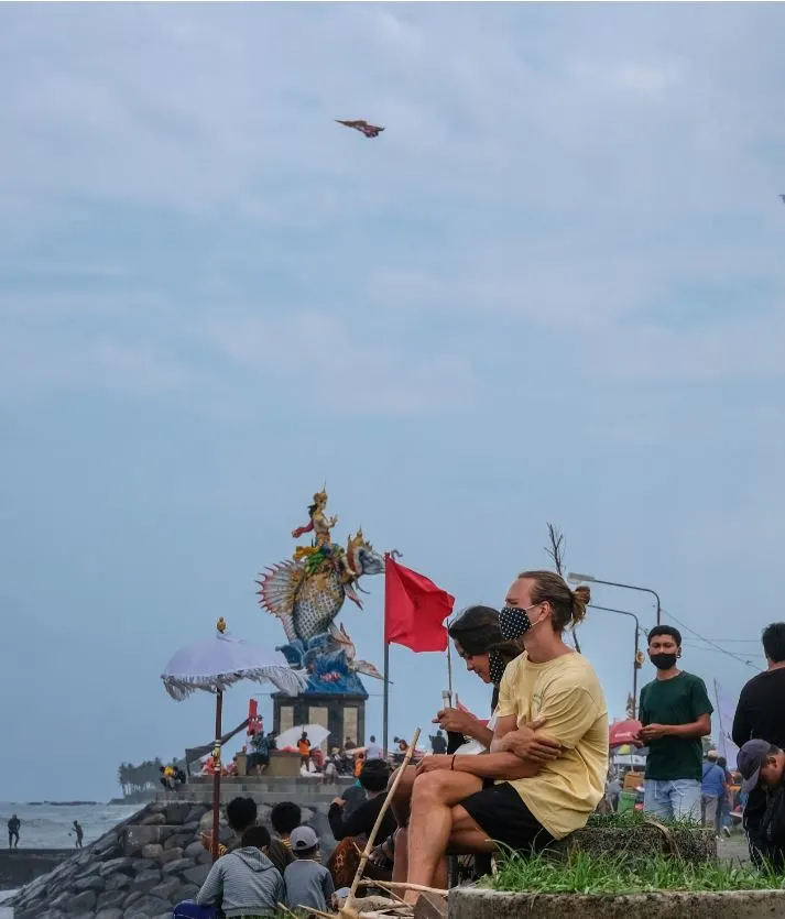 tourist in bali wearing mask