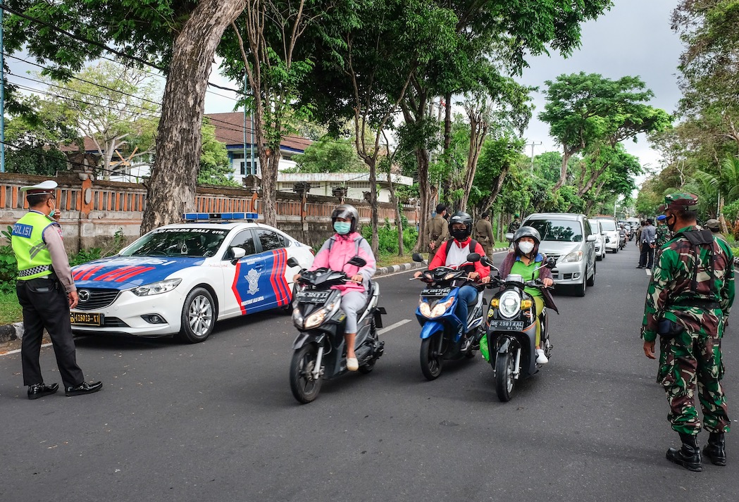 Motorcyclist Dies After Crashing Into Open Car Door In Badung