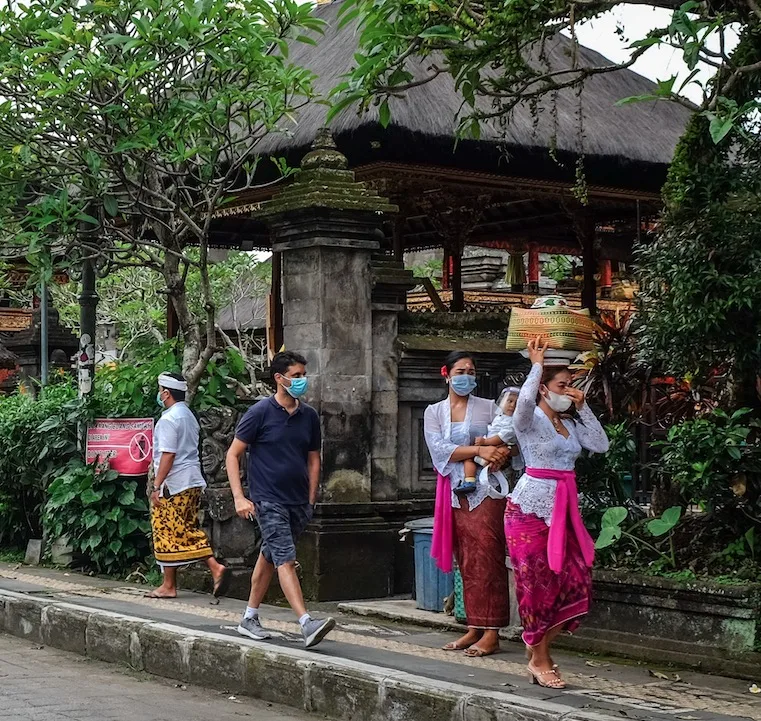 locals in masks Bali