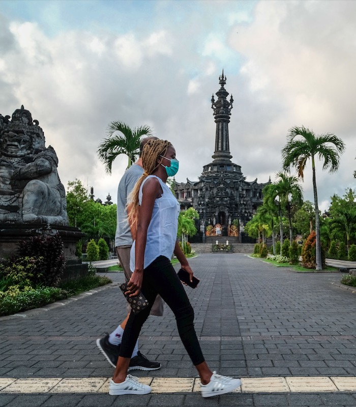 tourists Bali masks