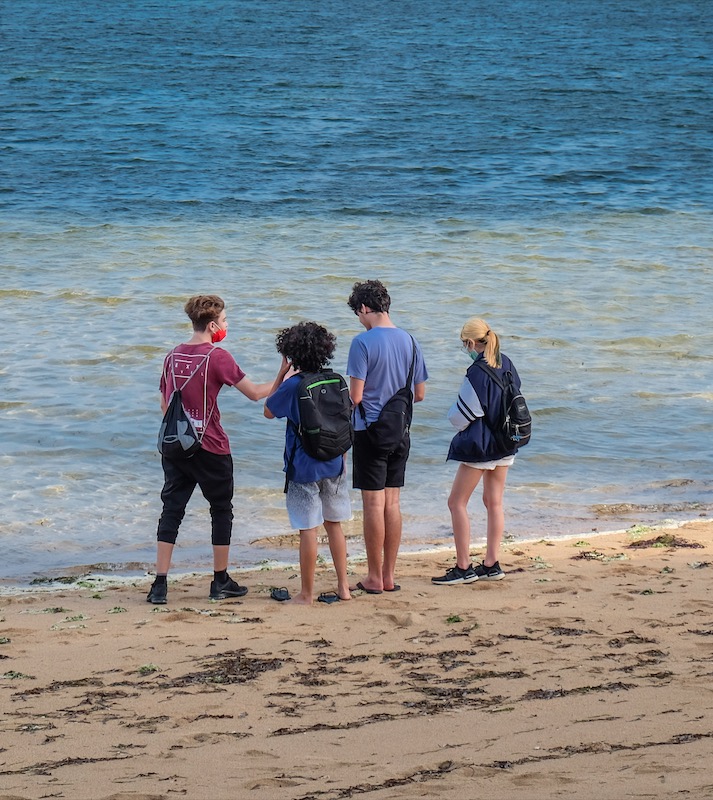 tourists at beach in Bali