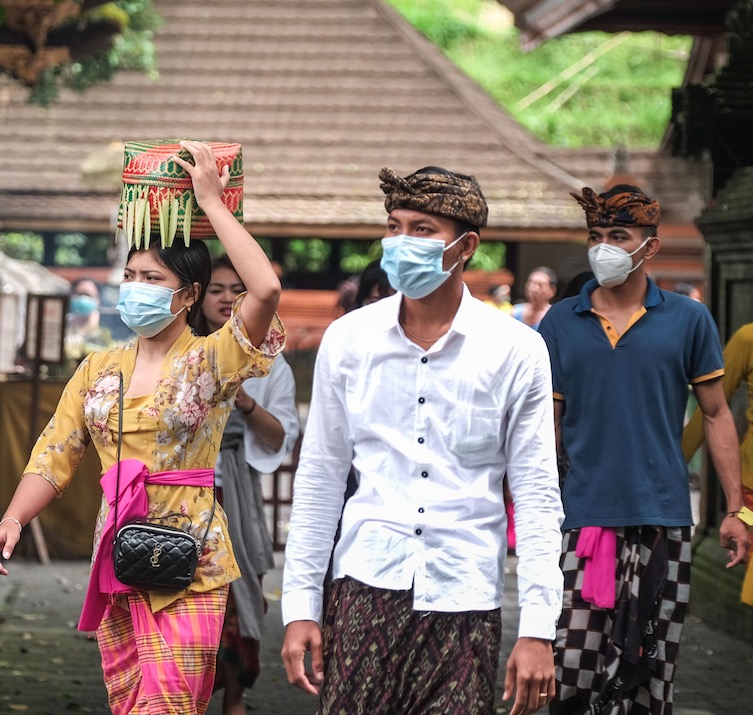 Bali locals in masks