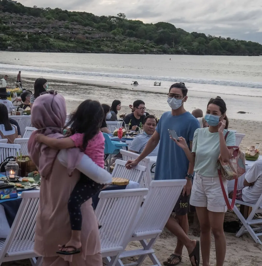 Bali locals masks beach party
