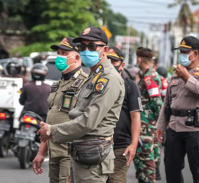 Bali police and army patrol