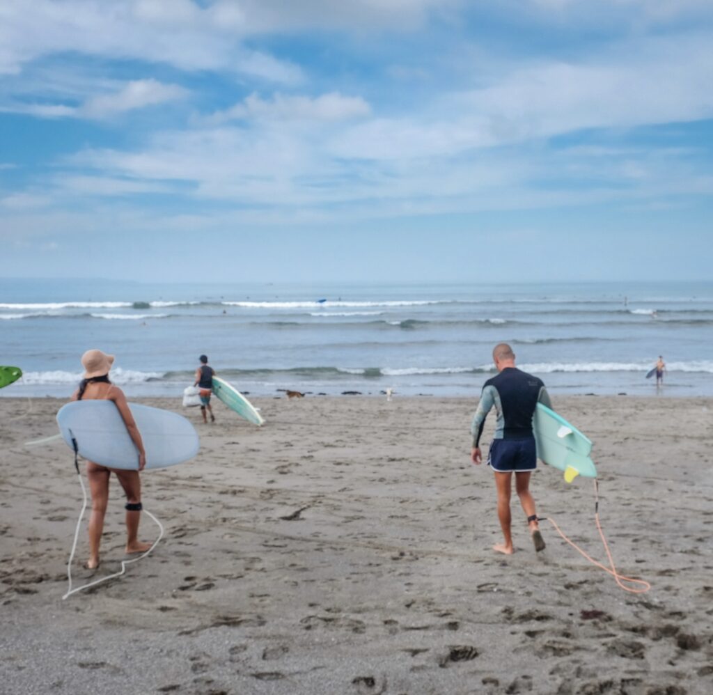 surfers at Bali beach