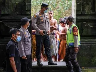 Officials Conduct Testing During Religious Ceremony In Bali