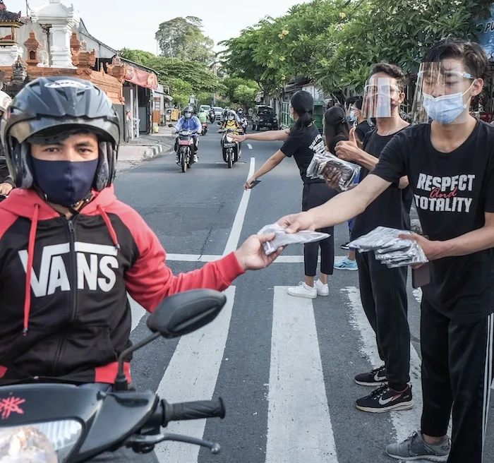 handing out free masks