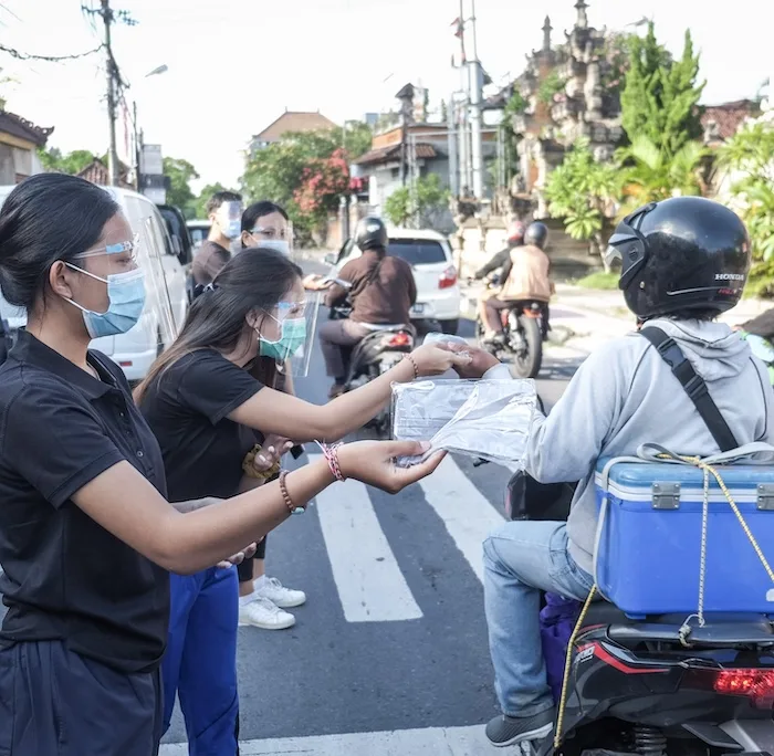 handing out masks