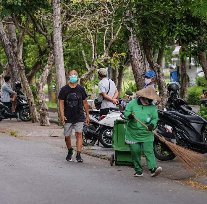 locals walking with masks