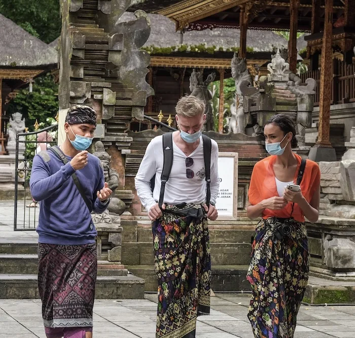 tourists face masks at temple