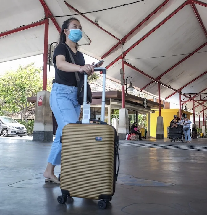 traveler Bali airport mask