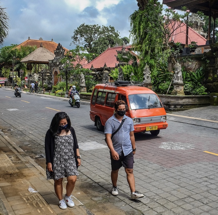 walking down Bali street masks