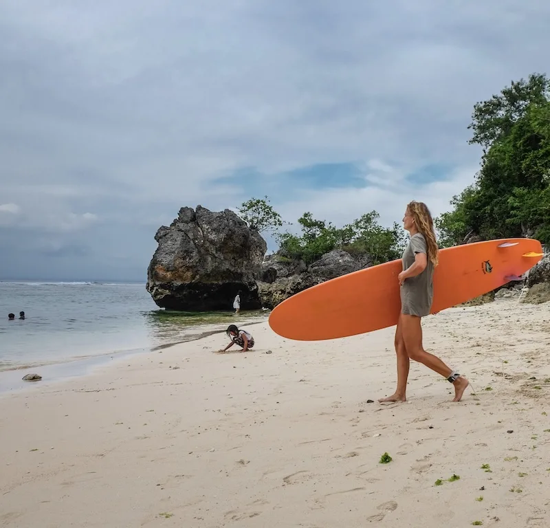 tourist surfing beach