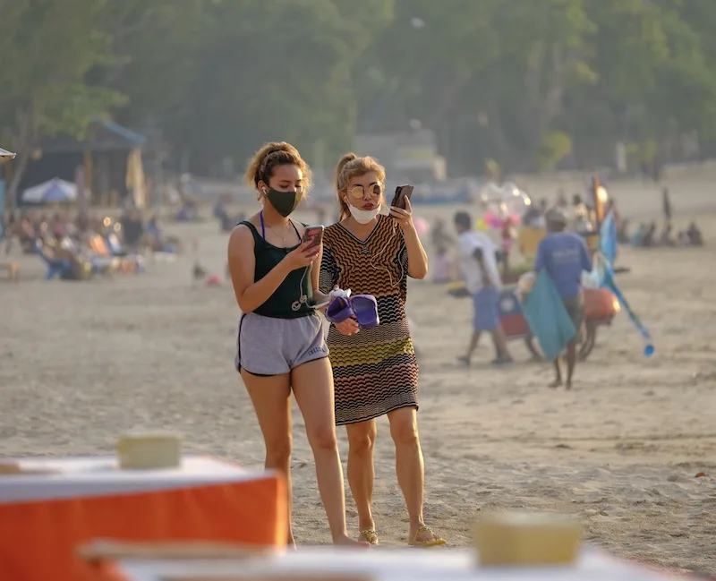 tourists beach masks