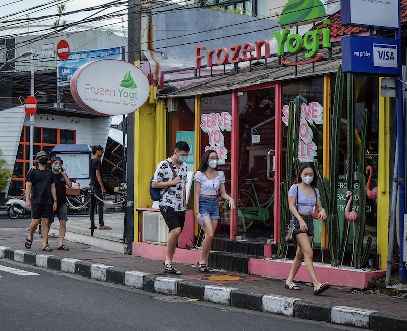 tourists in Bali masks