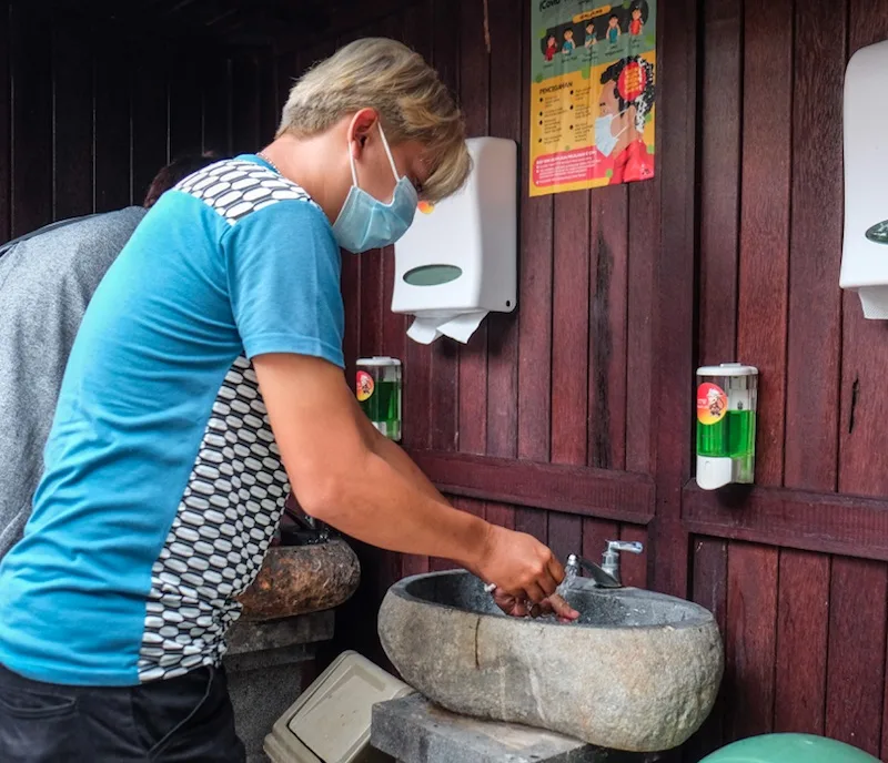 handwashing_sanitary_mask_covid_measures_health_safety_sink_outdoor_jpg