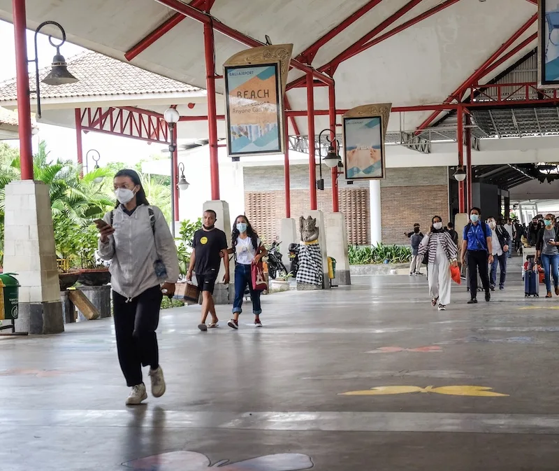 travelers at Bali airport