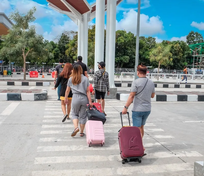 tourists arrive in Bali