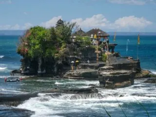 e majority of local vendors inside the Tanah Lot Temple area chose to remain closed despite the reopening of tourist attractions for domestic visitors.