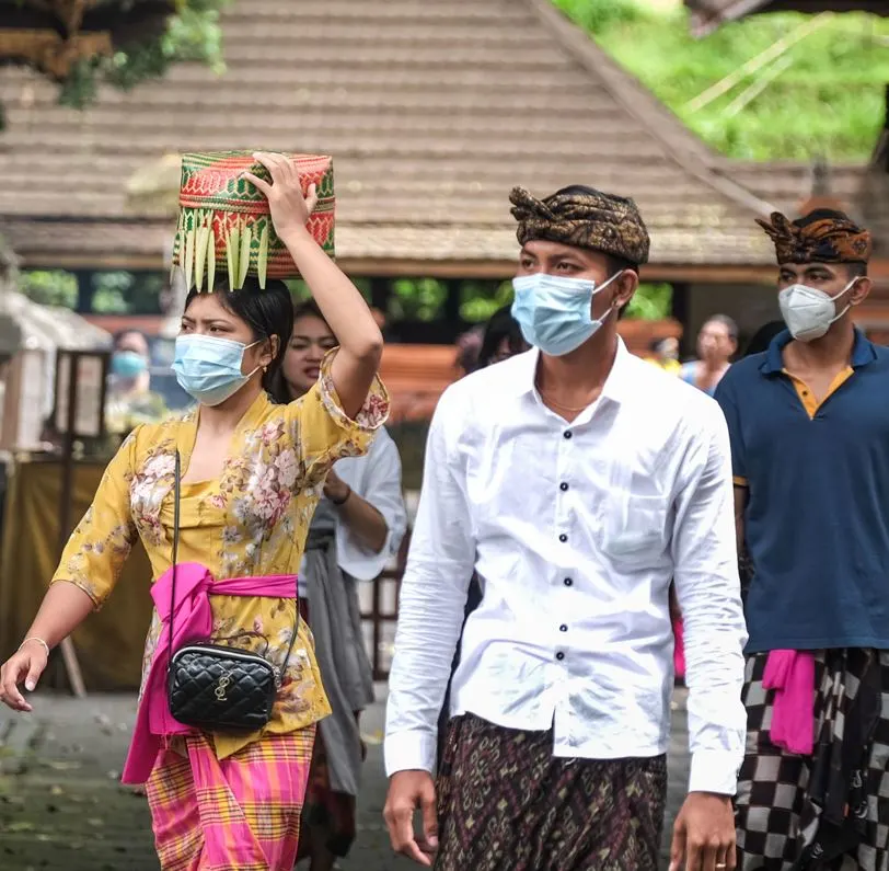 bali locals in masks