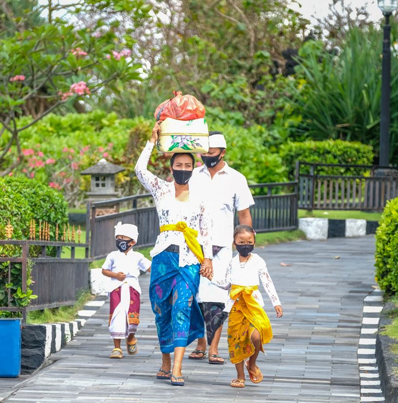 Bali family wearing masks