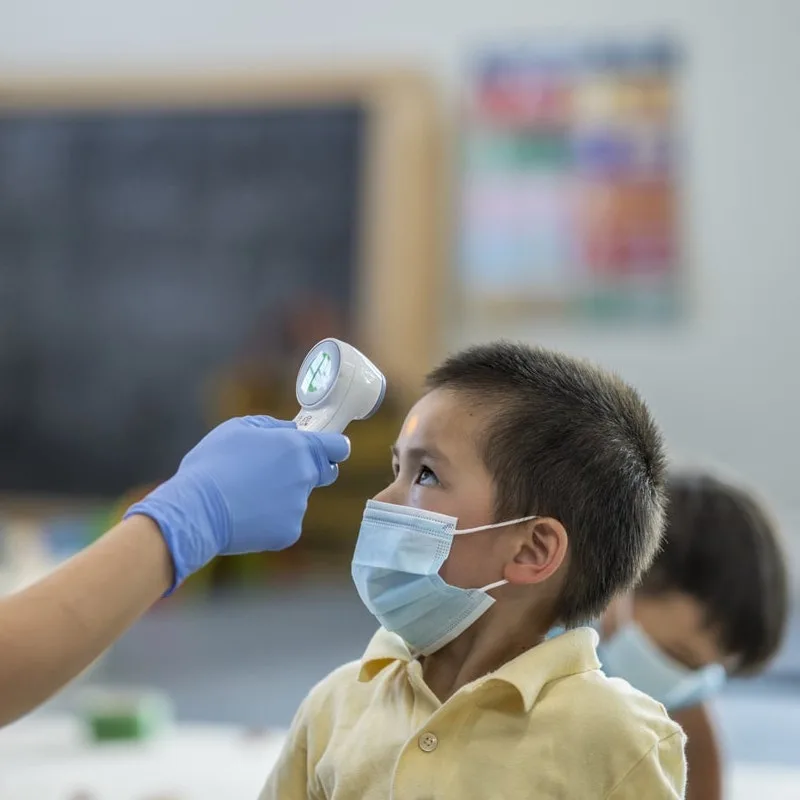 Elementary child in school during covid