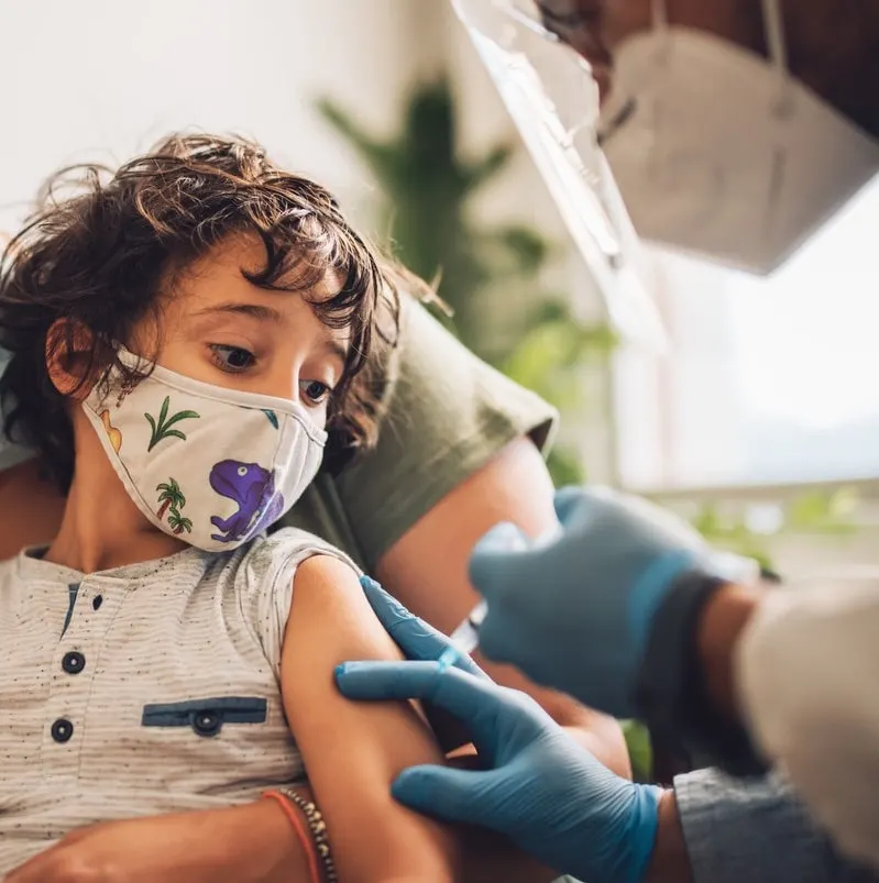 Kid getting covid vaccine