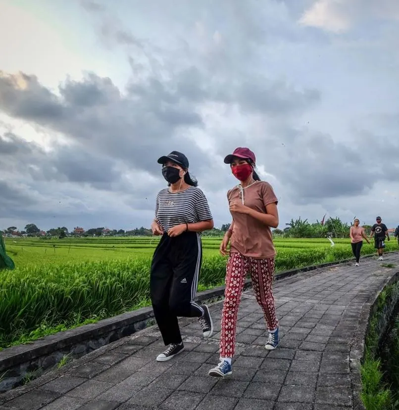 Women running in Bali
