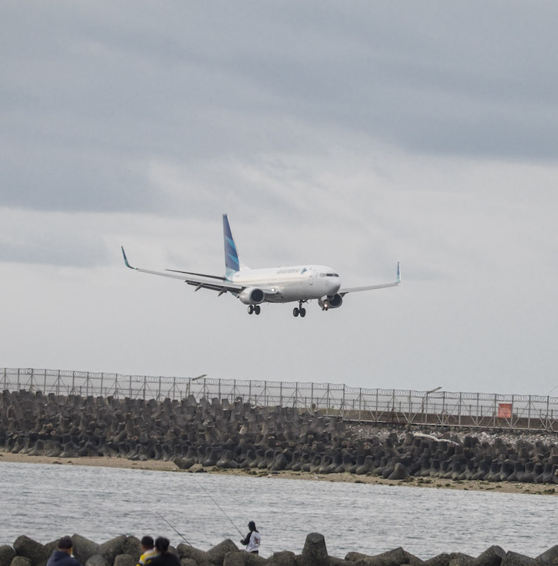 Bali plane arriving at airport
