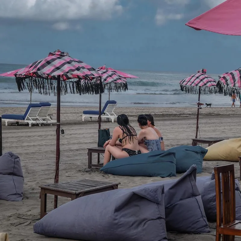 Bali tourists by the beach