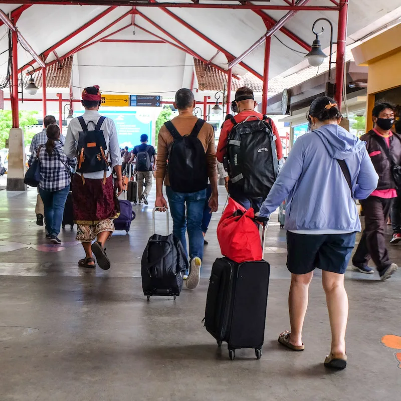 Tourists arriving in Bali