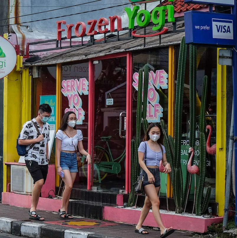 Tourists shopping in Kuta Beach area