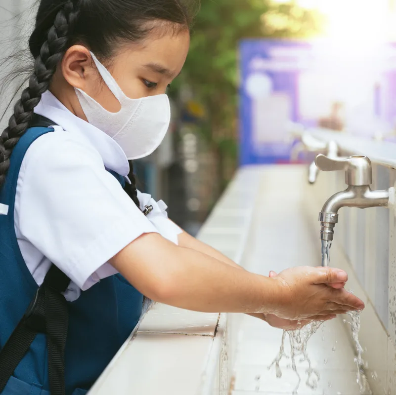 Child washing hands