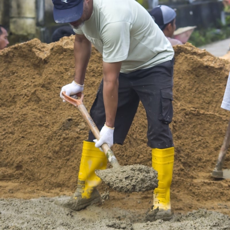 Indonesian man digging