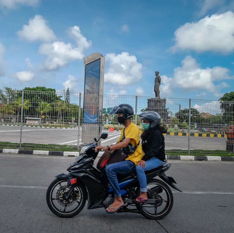 locals on motorbike