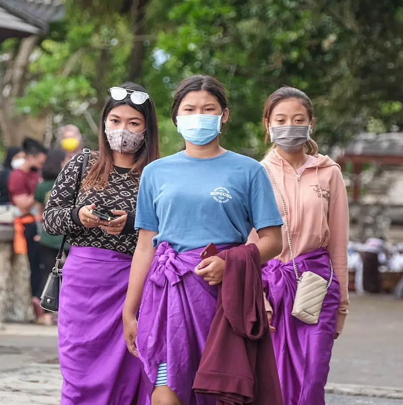 bali locals in masks