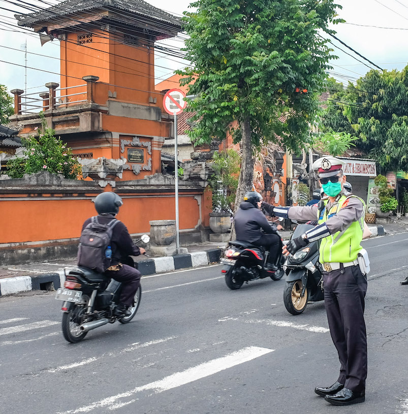police guiding traffic
