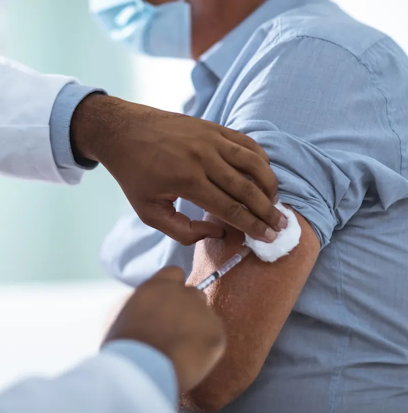 man receiving vaccine